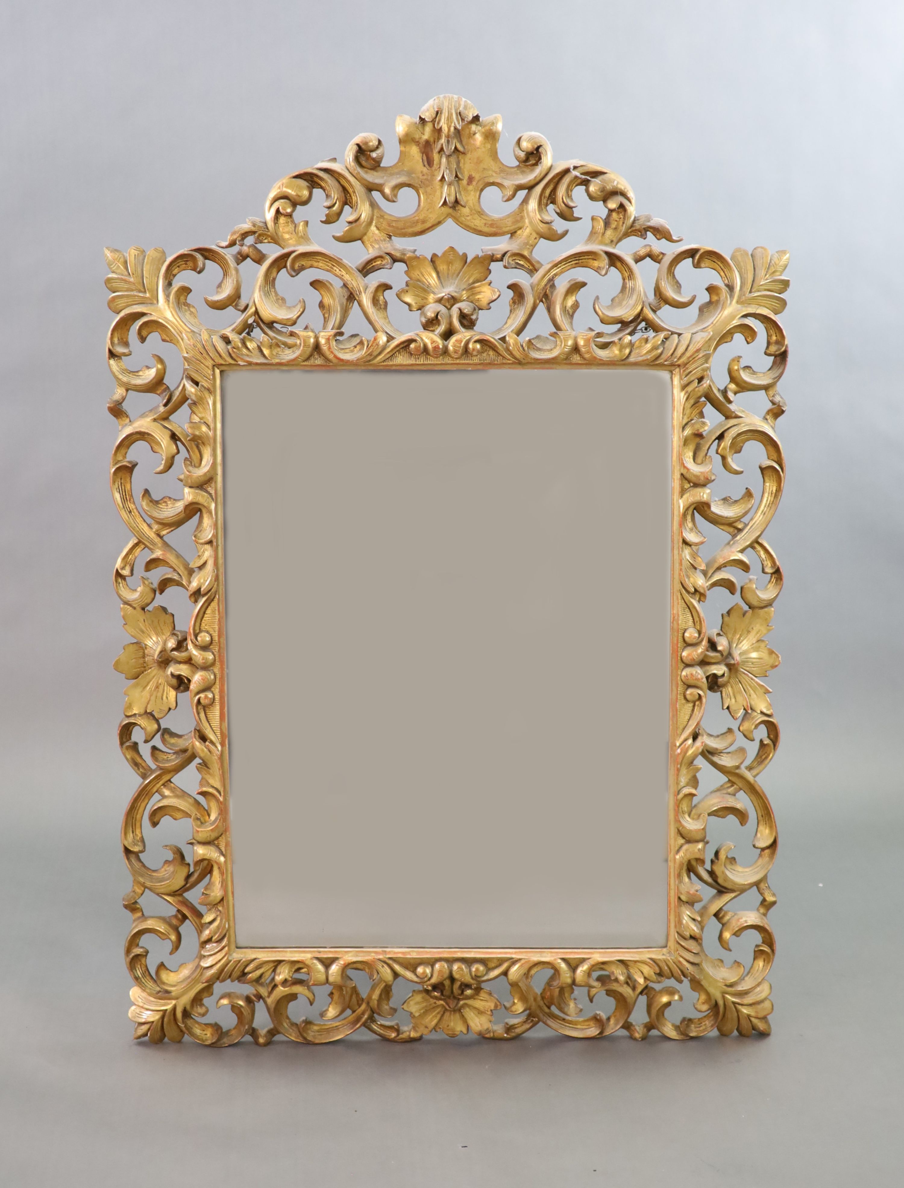 A late 19th century Florentine giltwood wall mirror, W.97cm H.138cm